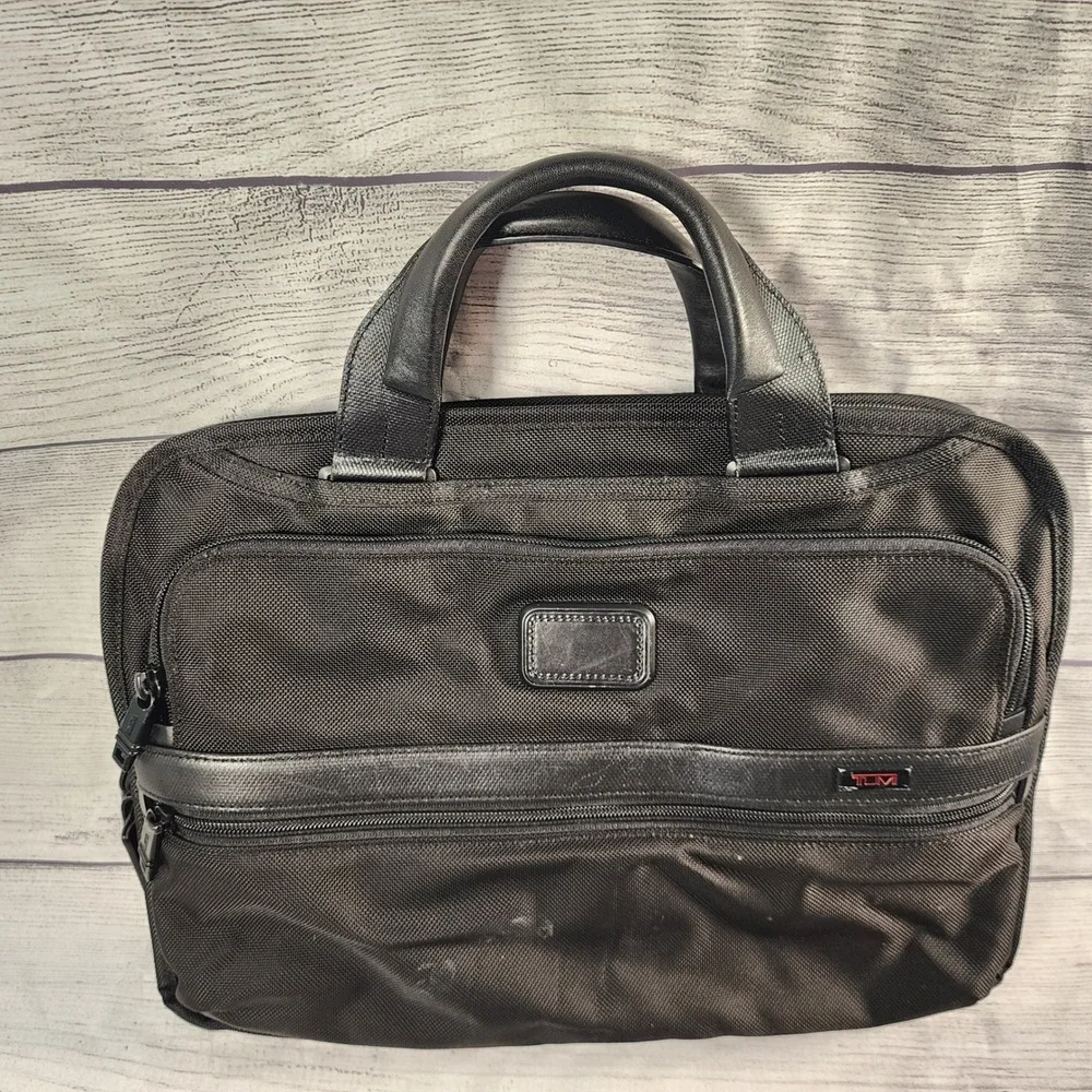 Tumi pre owned
